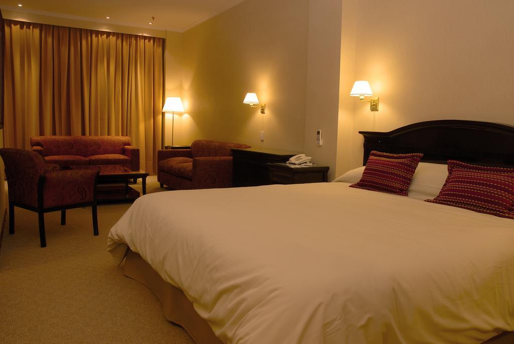 Status Hotel Ріо-Ґранде Номер фото